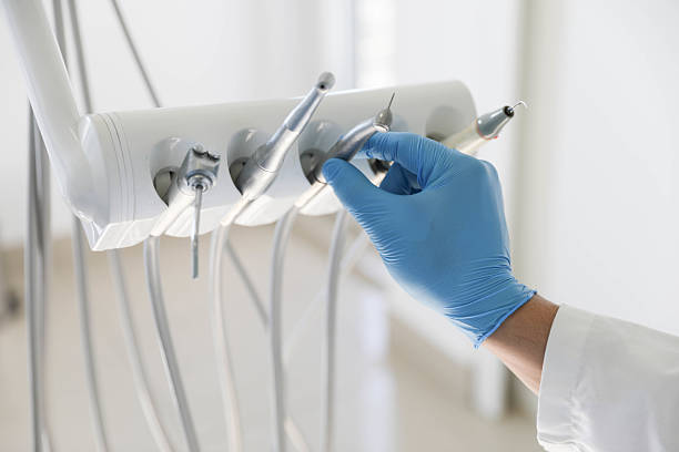 Professional Invisalign Clear Aligners technician working in Dickinson, ND